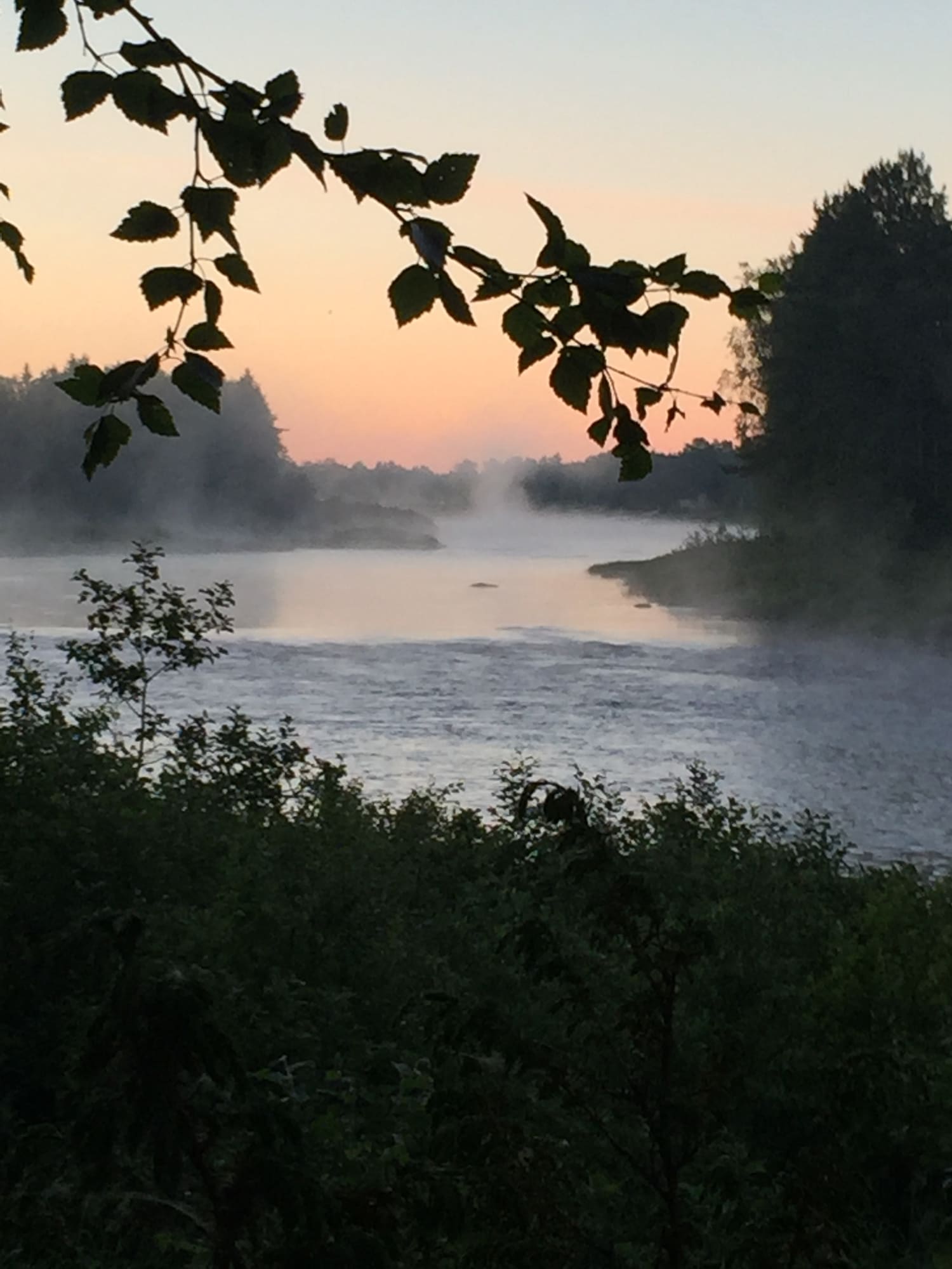 Mist over the Simojoki river at dawn